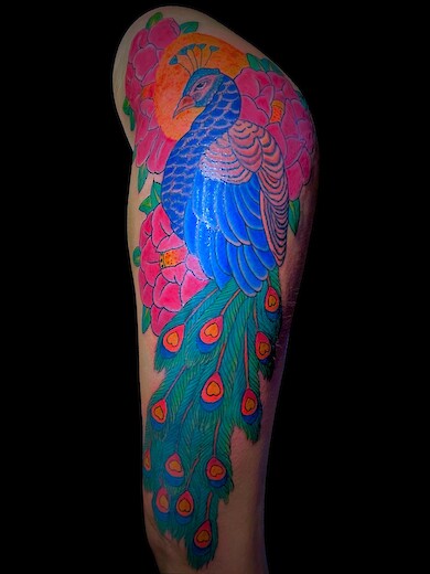 Calypso-Tattoo - Gallery - peacock lady tattoo upper leg